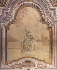 Obraz premium NOVARA, ITALY - JANUARY 15, 2026: The fresco of Elizabeth mother of St. John the Baptist in the church Chiesa di San Giovanni Decolato by Paolo Giovanni Crida (1958).