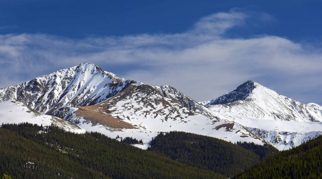   the  snow-capped mountains of  crystal peak and pacific peak in the ten mile range of the colorado rockies  from copper mountain,   colorado, in spring  