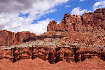 Fototapeta premium colorful, eroded cliffs and rock formations on a sunny summer day in capitol reef national park, near torrey, utah
