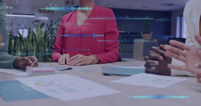 Left rep gesturing, office team stacking hands over charts, waveform hovering over hands for unity