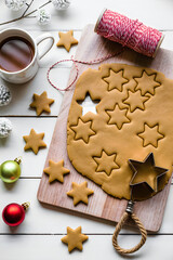 Christmas star cookies on wooden board