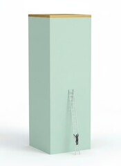 A tall, mint-green rectangular box with a subtle shadow and a small, black silhouette of a person climbing a ladder on its front, viewed from a slight angle.