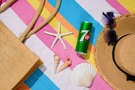 Vladimir, Russia - July 22, 2025: 7up can on the beach. A refreshing drink on a summer day