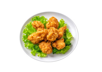Golden Fried Chicken A tantalizing plate of crispy, golden-brown fried chicken pieces rests upon a bed of fresh, vibrant green lettuce, offering a satisfying visual experience.