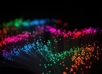Abstract Macro Shot of Glowing Fiber Optics Cables with Vibrant Multicolored Lights and Bokeh Effect Against a Dark Background