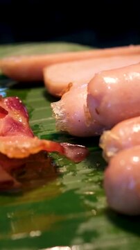 Bacon sausages leaves Delicious pizza with mozzarella, sausage mortadella with pistachio, stracciatella burrata and tomatoes cherry yellow. Concept of delivery. High quality 4k footage