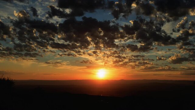 Inspirational Sunset with Sun and Clouds Zoom In Timelapse