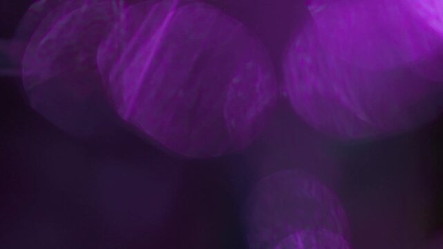 light leak and bokeh overlay with purple hues, perfect for adding cinematic flair to your projects. This visual adds depth and mood to motion graphics and video edits.