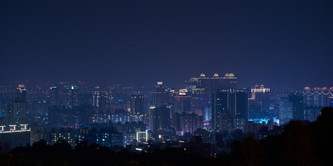 Obraz premium Taoyuan City Skyline - Asia modern business city, panoramic cityscape at night, shot in Taoyuan, Taiwan.