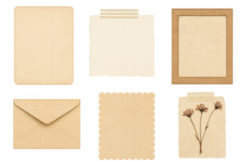 Fototapeta premium A flat lay of six vintage beige paper ephemera pieces including blank sheets, torn paper with tape, a kraft photo frame, an envelope, scalloped card, and a pressed flower paper