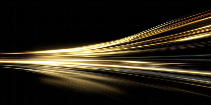 Brilliant golden light trails streak across a dark background suggesting rapid motion