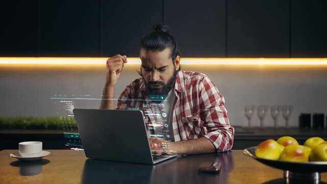 Indian male programmer working with holographic interface facing software error