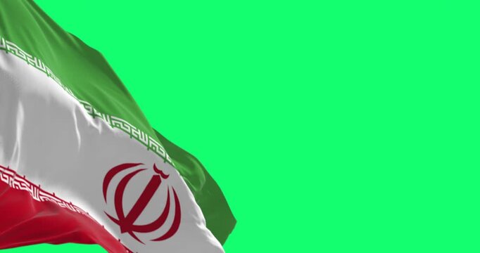 Islamic Republic of Iran national flag waving isolated on green background.