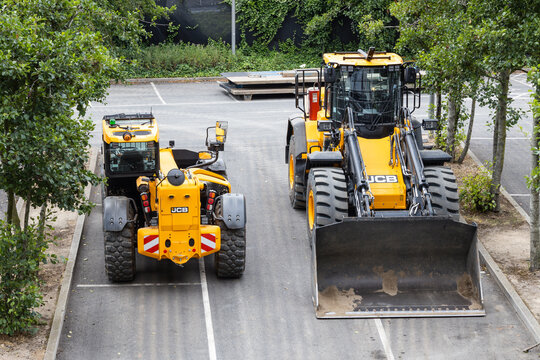 JCB wheel loader and telehandler on asphalt. London, UK, 14 July 2024