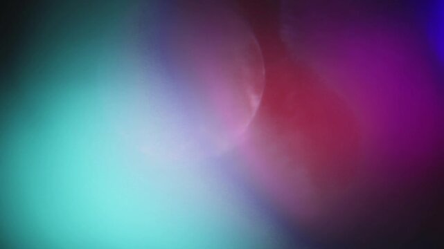 light leak and bokeh overlay with subtle color shifts in purple, blue, and pink tones. This video is perfect for adding a cinematic or artistic touch to your projects.
