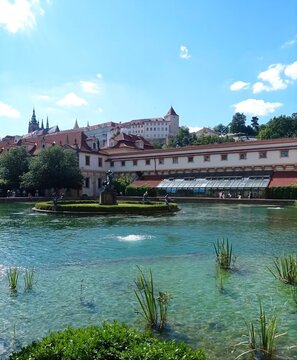 Wallenstein Garden Pond with Fountain and Prague Castle in Background, Czech Republic
