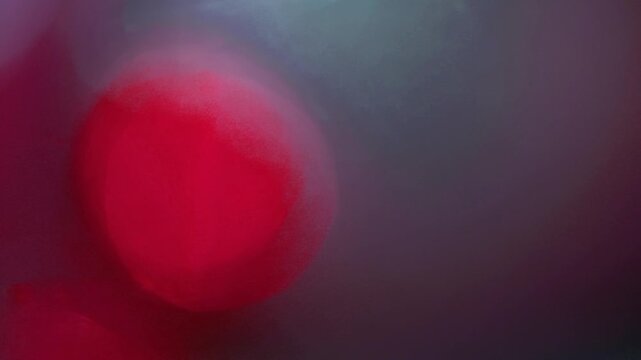 Light leak and bokeh overlay with red and blue hues, perfect for adding a cinematic and artistic touch to video projects. This effect can enhance mood and visual appeal.
