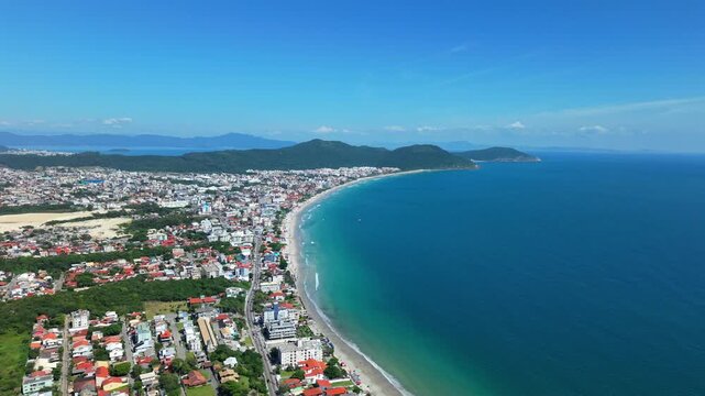 Aerial view of coastal and popular Praia Dos Ingleses beach with turquoise Atlantic Ocean, Florianopolis, Santa Catarina, Brazil