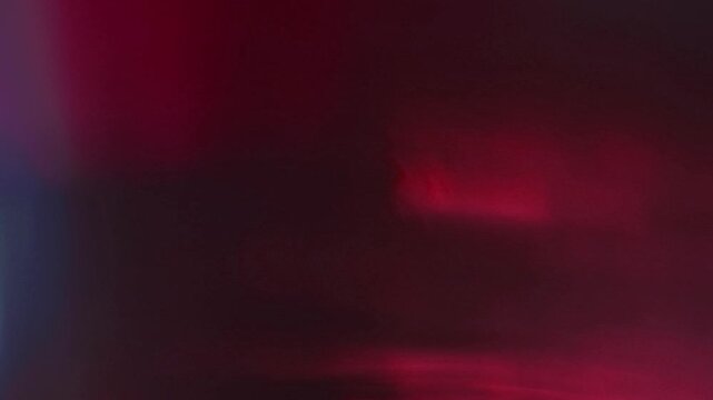 Light leak and bokeh overlay with red and yellow hues, featuring soft circles of light and film burn effects. Ideal for adding a cinematic touch or emotional mood to your projects.