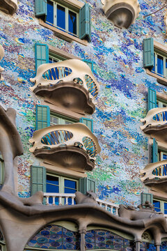 Barcelona, Spain 10-05-2025 A view on the spectacular facade of the Casa Batllo in the centre of Barcelona, which is a design by Gaudi and it is unique with it's natural shapes and colourful mosaic or