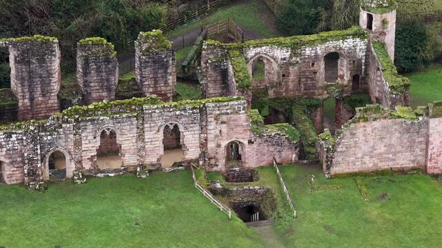 Aerial drone footage of the village of Spofforth in Harrogate North Yorkshire England showing the ruins of the Spofforth Castle on a cold day in the winter time