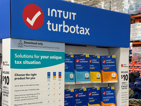 Northville, Michigan, USA - Jan 31, 2026 : Costco shelf display featuring multiple Intuit TurboTax editions, including Deluxe, Premier, and Business for federal and state income tax filing options.