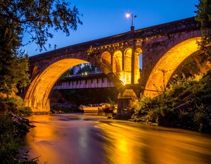 A serene evening scene of a historic bridge over a river