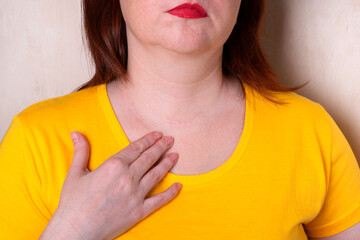 Surgical scar after thyroid surgery (thyroidectomy) on a woman's neck