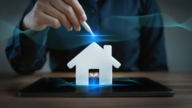 digital real estate investment concept, Business person using stylus pen on tablet with white house model and virtual financial growth plant icon, Asset allocation, Passive income, Wealth Investment