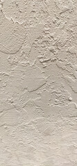 Obraz premium Close-up of a weathered concrete wall surface. Ruggedness and architectural texture.