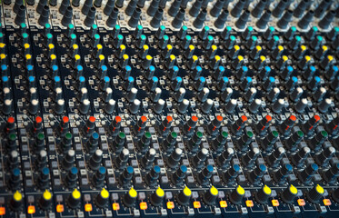 Fototapeta premium Detailed Top View of Professional Multi-Channel Audio Mixing Console