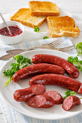 Smoked isterband sausages on a plate
