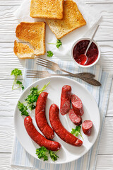 Smoked isterband sausages on a plate