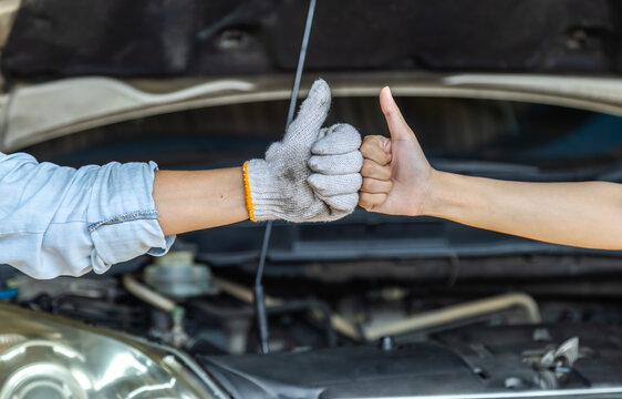 Auto repair shop, small business, technology, woman garage owner holds hiring sign and wrench, expanding workshop team, new mechanic job opening, career growth, middle-aged mechanics female happy work
