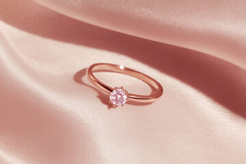Ring, jewelry and diamond on satin fabric for elegance, luxury and fashion. Closeup, accessory and gemstone with shine for beauty and style.