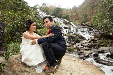 Portrait Wedding on huge Mae Ya waterfall Wedding in Asia