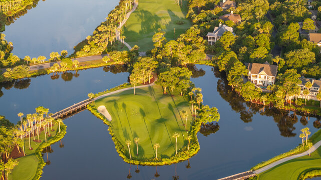Aerial view of beautiful golf course landscape near oceanfront beach on lowcountry Kiawah Island near Charleston, South Carolina during morning sunrise