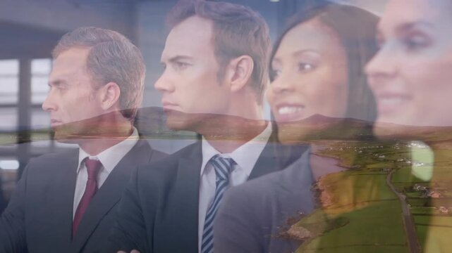 Composite video of diverse businesspeople smiling against aerial view of grassland and sea