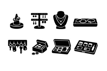 Various jewelry and accessories displayed with key holders and makeup boxes