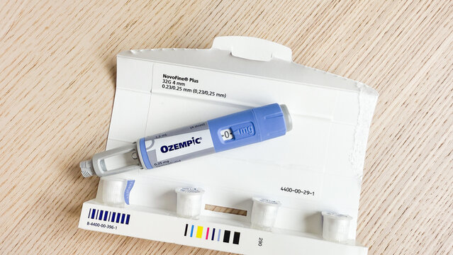 Vividly blue Ozempic pen rests like a futuristic relic on minimalist desk, hinting at World Diabetes Day's legacy Ozempic, GLP 1, Semaglutide, January 5 2026, Subotica, Serbia