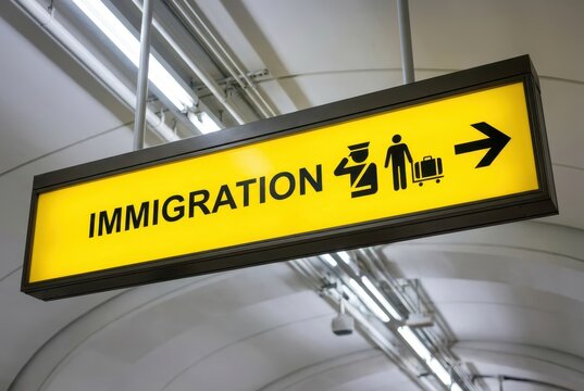 Immigration Process Signage at Airport Terminal, Travel Context, Urban Environment, Informational Display