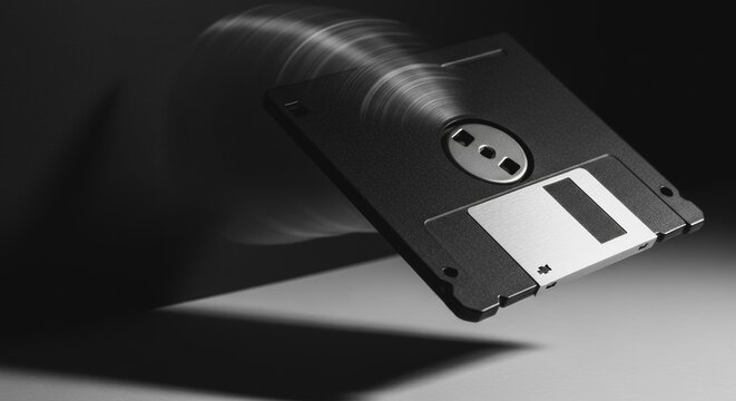 Retro 3.5-inch floppy disk with motion blur, symbolizing rapid data transfer and obsolete computer technology