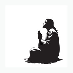 silhouette of a man sitting praying