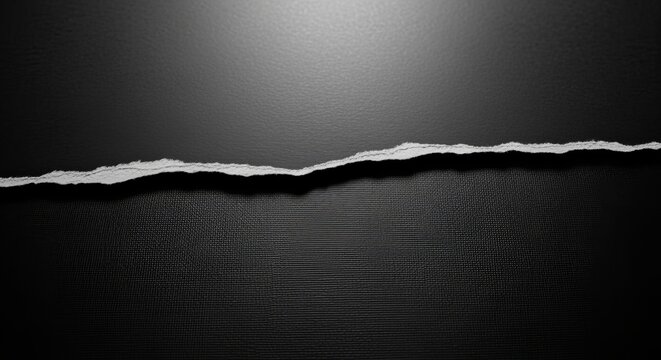 torn black paper edge with rough texture and ripped surface revealing underlying dark layer with subtle shading and dramatic lighting effects creating contrast