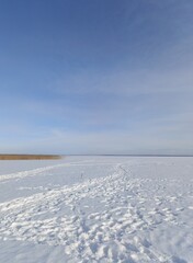 frozen snow-covered large lake