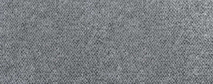 Gray textured melange fabric background showing textile surface