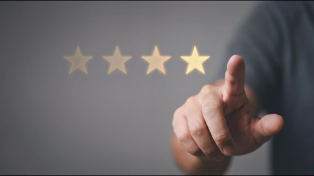 Close-up of a hand extending forward to tap the fifth glowing star in a horizontal rating row, subtle fingertip interaction with slow cinematic push-in, neutral background and shallow depth of field f