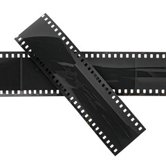 Fototapeta premium Two Strips of Black 35mm Film Crossing on a White Background.