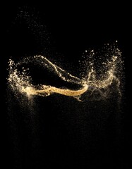 Obraz premium Abstract Golden Glitter Dust Explosion Against a Black Backdrop
