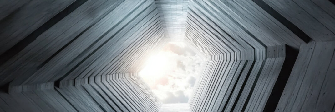 Abstract building facade concrete void or tunnel with natural light in the end in twist view